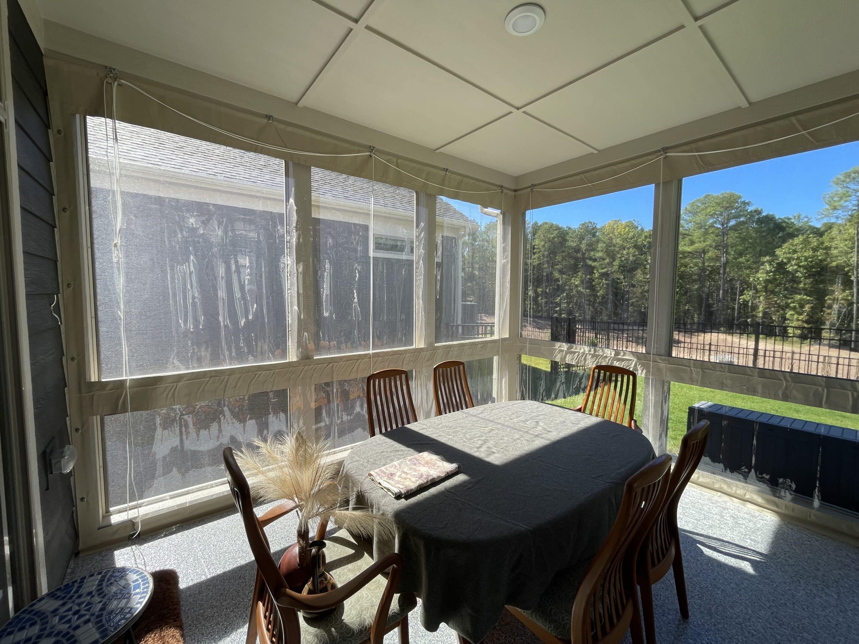 newly installed exterior vinyl screens on a stunning mebane porch